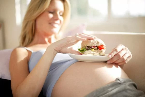 Regeln der Ernährung für eine Leihmutter foto Regeln der Ernährung für eine Leihmutter Bild